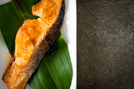 Grilled Salmon Steak with Soy Sauce on plate - Japanese food styleの写真素材