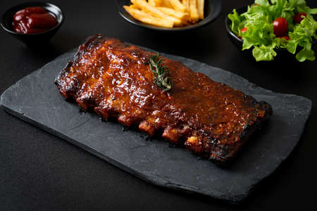 grilled and barbecue ribs pork with BBQ sauceの写真素材