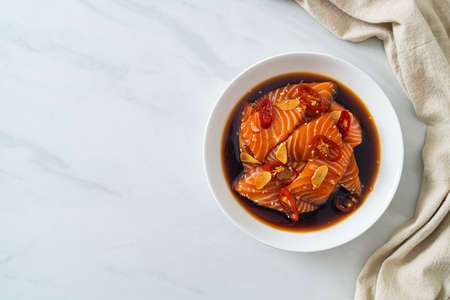fresh salmon raw pickled in shoyu sauce or soy sauceの写真素材