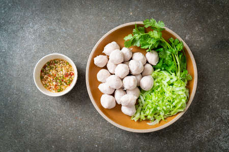 pork meatball with fresh vegetable and spicy dipping sauceの写真素材