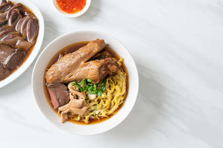egg noodles with stewed and braised duck in brown soup - Asian food styleの写真素材