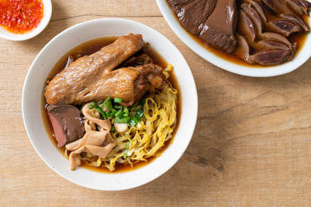 egg noodles with stewed and braised duck in brown soup - Asian food styleの写真素材