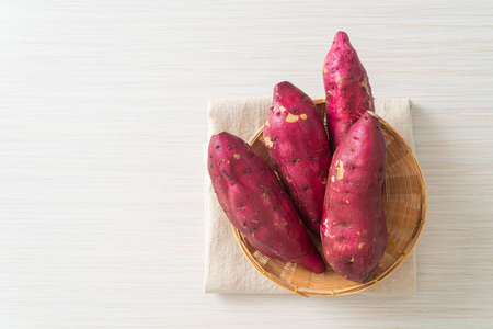 fresh Japanese sweet potatoes on basketの写真素材