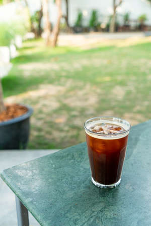 iced americano coffee glass on table in coffee shop cafe and restaurantの写真素材