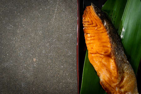 Grilled Salmon Steak with Soy Sauce on plate - Japanese food style