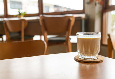 dirty coffee glass on table in coffee shop cafeの写真素材