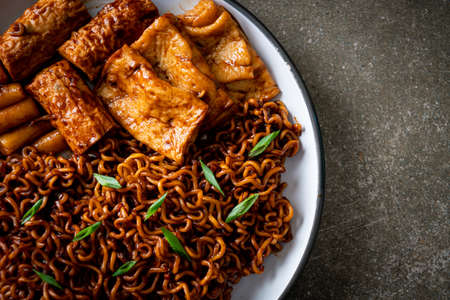 Jajangmyeon or JJajangmyeon with Odeng and Omuk - Korean Instant noodles with Korean fish cake in...