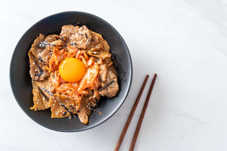 pork bulgogi rice bowl with kimchi and Korean pickled egg - Korean food styleの写真素材