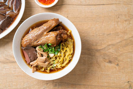egg noodles with stewed and braised duck in brown soup - Asian food styleの写真素材