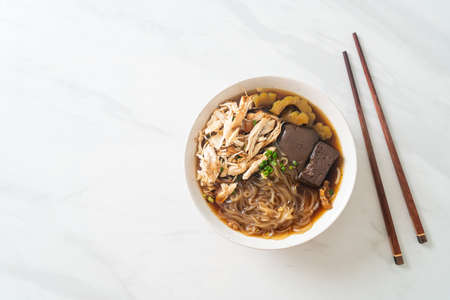 Stewed Chicken Noodle in Brown Soup Bowl - Asian food styleの写真素材