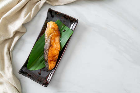 Grilled Salmon Steak with Soy Sauce on plate - Japanese food style