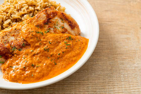 grilled chicken steak with red curry sauce and rice - muslim food styleの写真素材