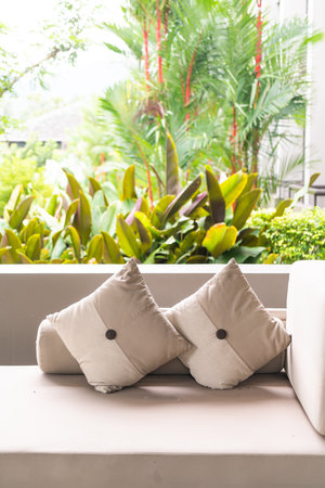 comfortable pillows on sofa in relaxing area