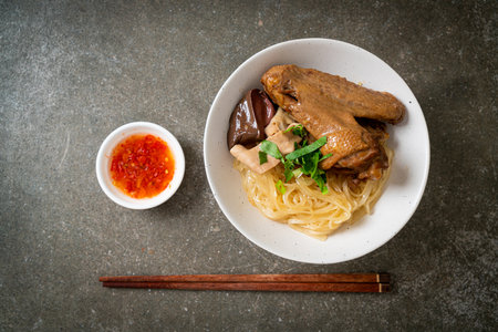 dried noodles with braised duck in white bowl - Asian food styleの写真素材