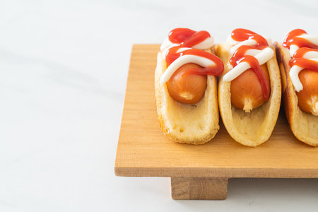 homemade flat pancake roll with sausageの写真素材