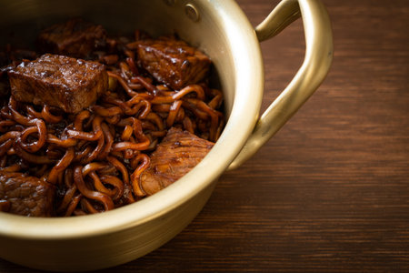 Jjapaguri or Chapaguri, Korean Black Beans Spicy Noodles with Beef - Korean food styleの写真素材