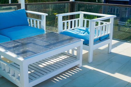 blue and white patio outdoor chair and table