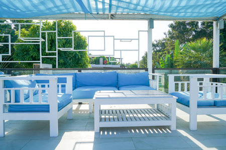 blue and white patio outdoor chair and tableの写真素材