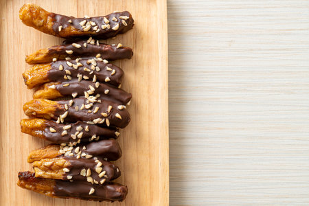 solar sun dried banana chocolate coating or banana dipped chocolateの写真素材