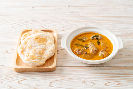 Chicken curry soup with roti or naan with chicken tikka masala - Asian food styleの写真素材