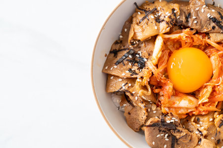 pork bulgogi rice bowl with kimchi and Korean pickled egg - Korean food styleの写真素材