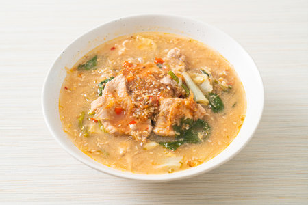 Sukiyaki Soup with Pork in Thai Style or  boiled vermicelli with pork and vegetables in sukiyaki soup - Asian food styleの写真素材