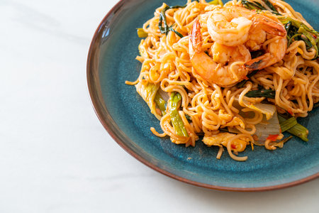 Stir-fried instant noodles sukiyaki with shrimps - Asian food styleの写真素材