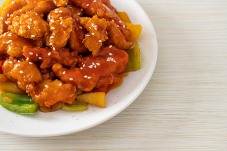 fried crispy chicken with sweet and sour sauce in Korean styleの写真素材
