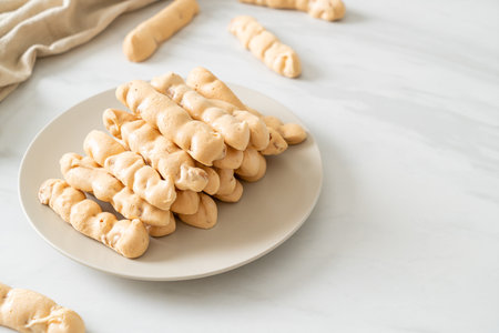 almonds meringue stick on plate - French snack dessert styleの写真素材