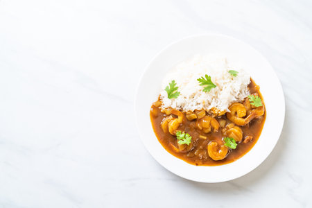 Shrimps in curry sauce on topped riceの写真素材