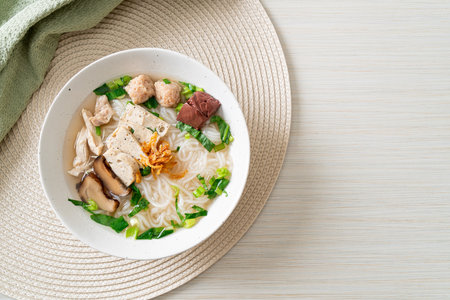 Vietnamese Rice Noodles Soup with Vietnamese Sausage served vegetables and crispy onion - Asian food styleの写真素材