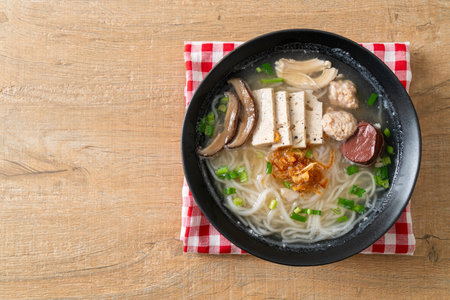 Vietnamese Rice Noodles Soup with Vietnamese Sausage served vegetables and crispy onion - Asian food styleの写真素材