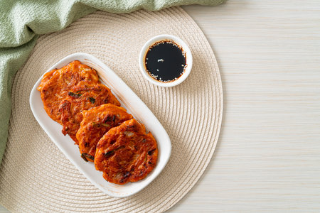 Korean Kimchi pancake or Kimchijeon - Fried Mixed Egg, Kimchi, and Flour - Korean traditional food styleの写真素材
