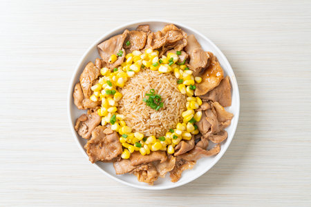 fried rice with pork sliced and corn in Japanese styleの写真素材