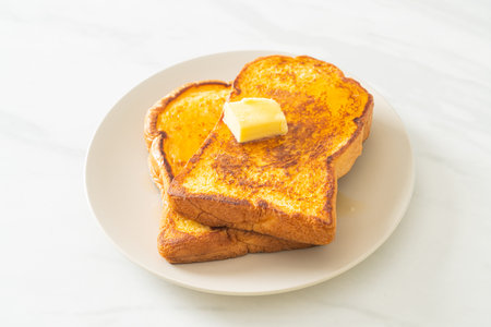 French toasted with butter and honey for breakfastの写真素材