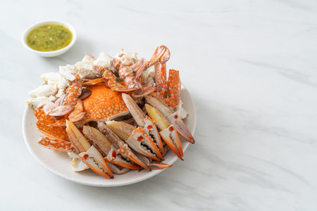 Steamed blue crab with spicy seafood sauce - seafood styleの写真素材