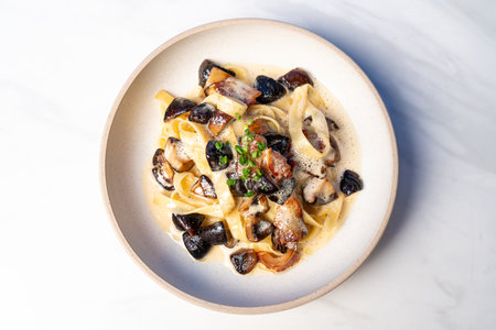 fettuccine spaghetti pasta truffle mushroom on plateの写真素材