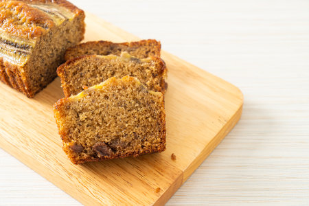 banana cake sliced on wood board