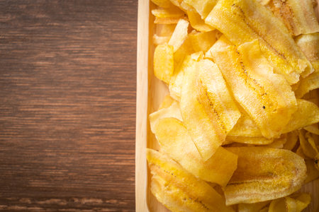 Crispy Banana Chips - fried or baked sliced bananaの写真素材