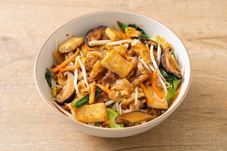 stir-fried noodles with tofu and vegetables - vegan and vegetarian food styleの写真素材
