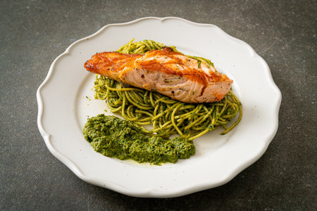 Spaghetti pesto with grilled salmon - Italian food styleの写真素材