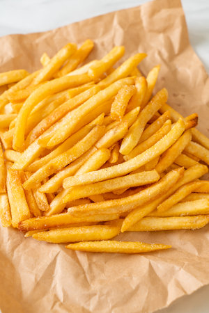 French fries or potato chips with sour cream and ketchupの写真素材