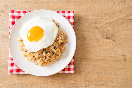 fried rice with pork and fried egg in Japanese style - Asian food styleの写真素材