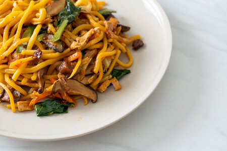 stir-fried yakisoba noodles with vegetable in vegan style - Vegan and vegetarian food styleの写真素材