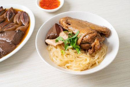 dried noodles with braised duck in white bowl - Asian food styleの写真素材