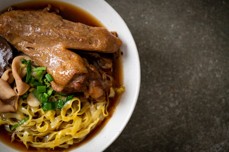 egg noodles with stewed and braised duck in brown soup - Asian food styleの写真素材