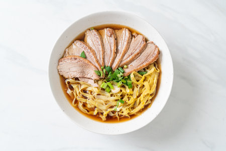egg noodles with stewed duck in brown soup - Asian food styleの写真素材