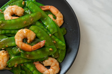 Stir-Fried Green Peas with Shrimp - Homemade food styleの写真素材