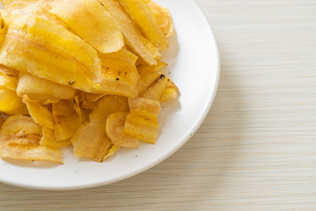 Crispy Banana Chips - fried or baked sliced bananaの写真素材