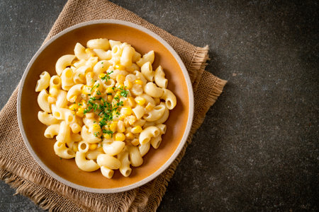 macaroni with creamy corn cheese on plateの写真素材
